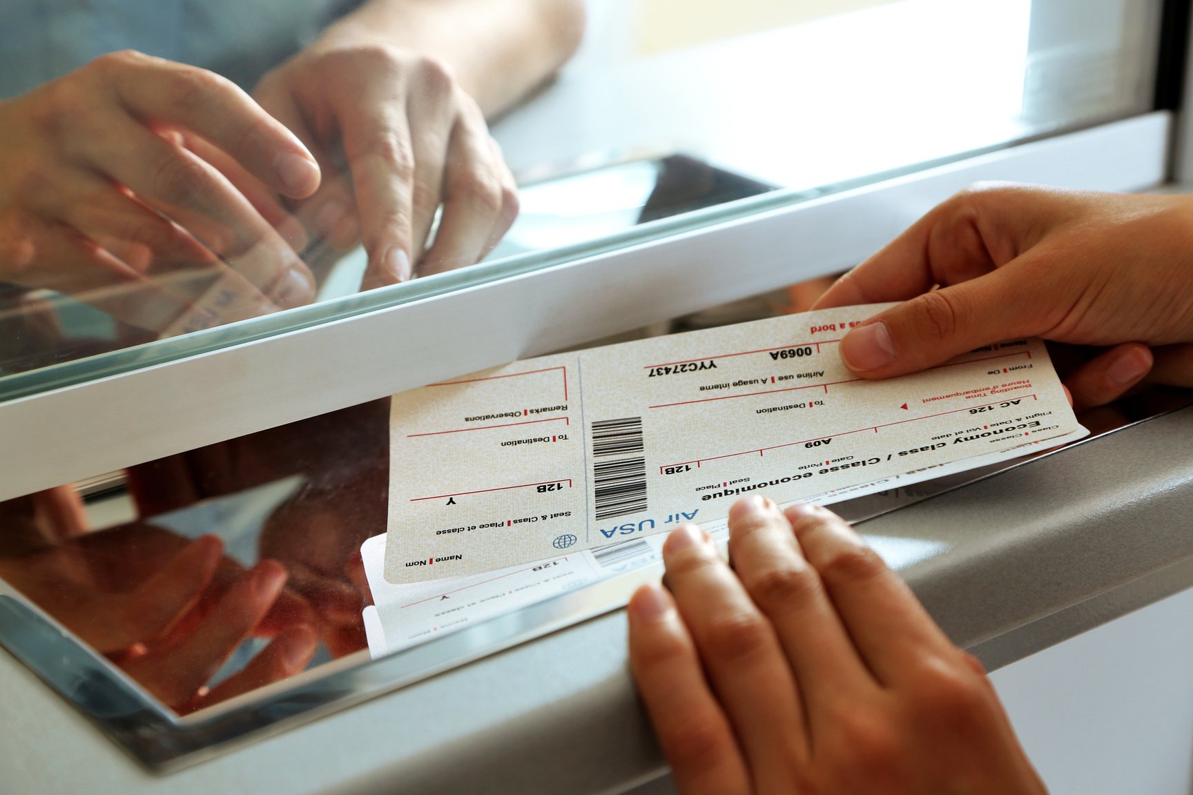 Woman Buying Tickets at Box Office